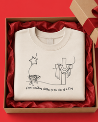 Load image into Gallery viewer, Swaddling Clothes to a King's Robe | Unisex Premium Sweatshirt (Black Print)